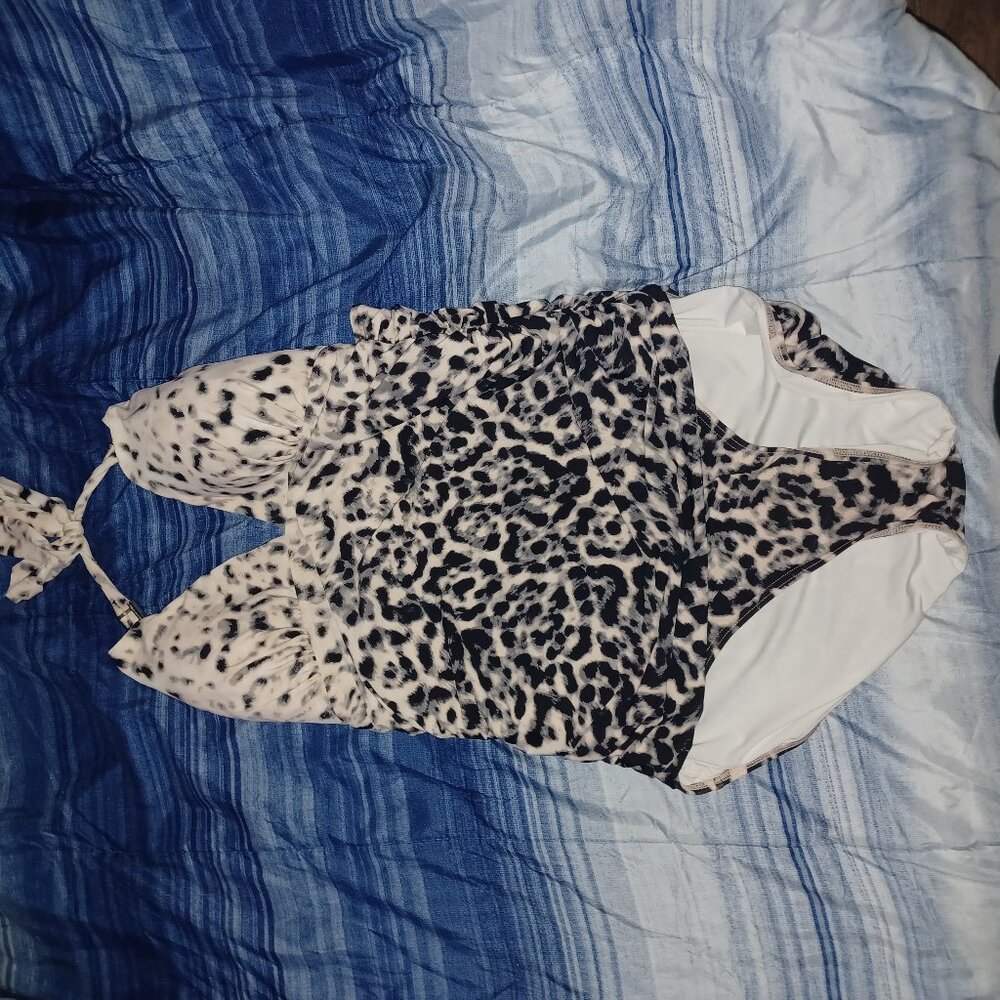 One piece swimsuit.